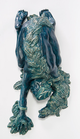 ICARUS by Janet Hunter in Greek myth made wings of wax in order to fly but flew too close to the sun melting the wax; a crouching winged man, arms extended in free fall; an allegory for hubris